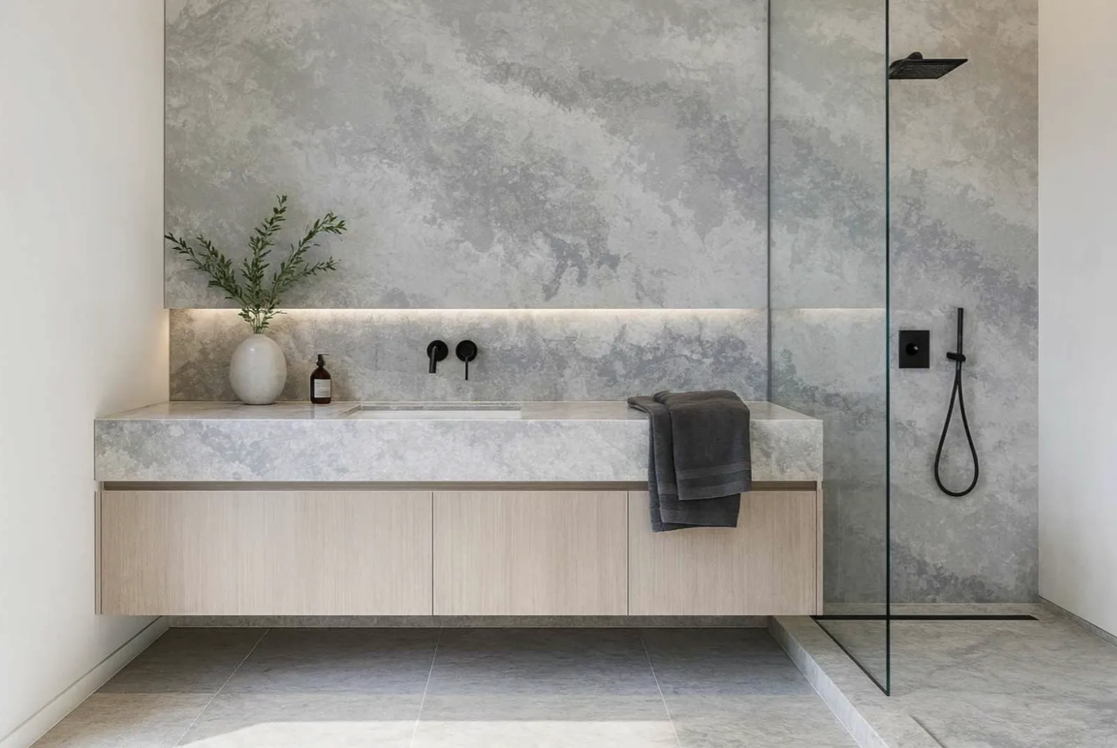 Bathroom with Cloud Grey stone walls, floating vanity and walk in shower